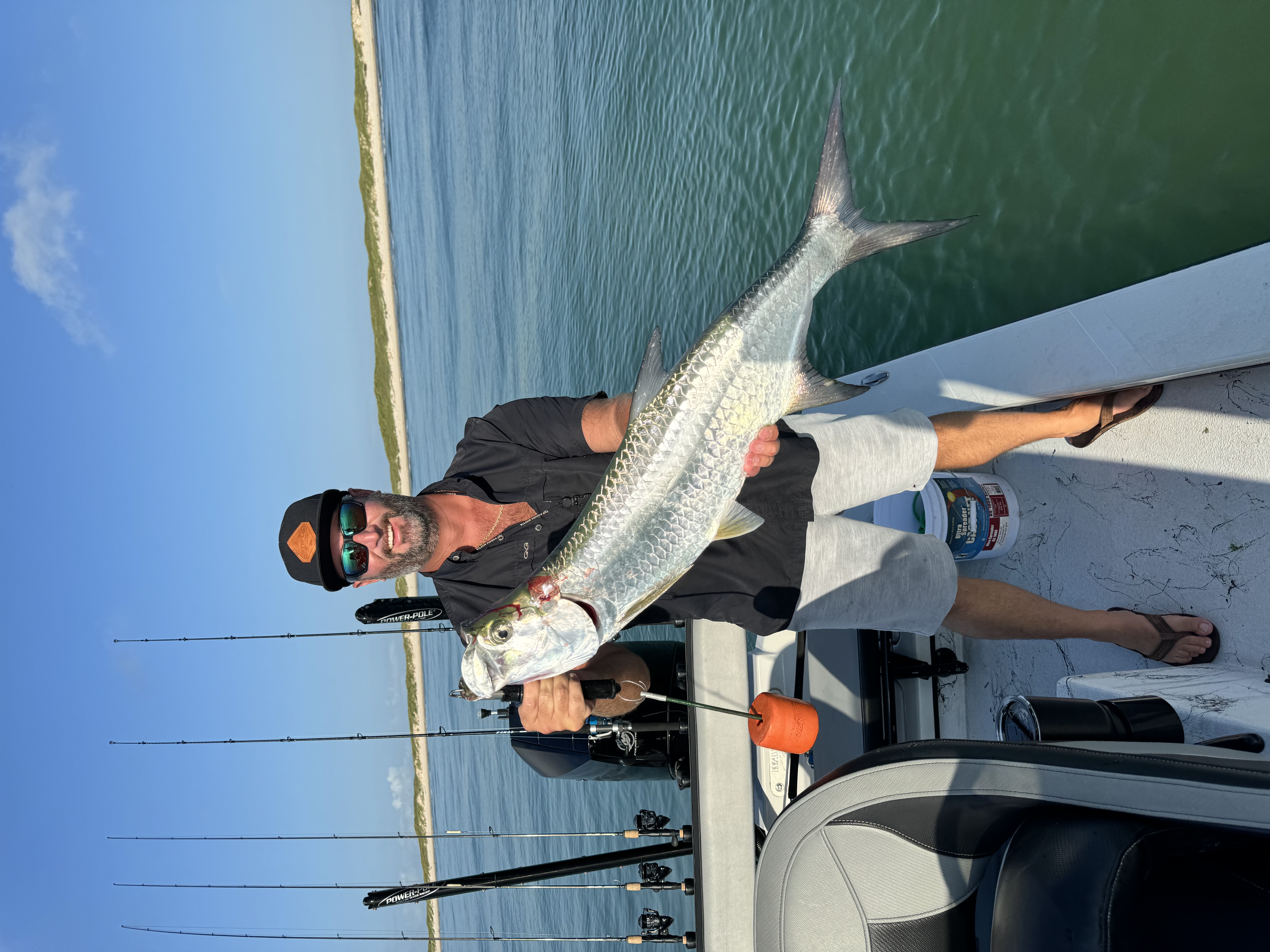 Captain Chris with tarpon on the Laguna Madre